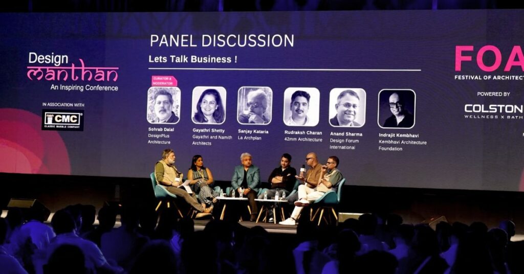 Modern conference setup with digital screens, live presentations and audience interaction.