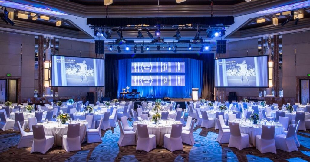 Elegant business event dining and hospitality setup at a corporate venue.